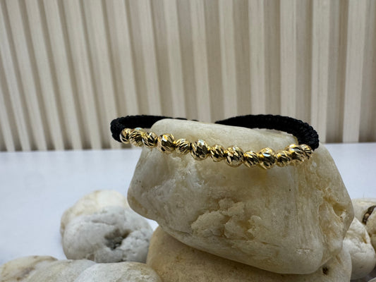 Pulsera tejida con balines