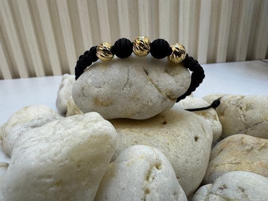 Pulsera tejida con balines